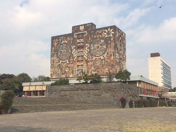 View of the National Autonomous University of Mexico Library, its outer surfaces covered in a mural by Mexican artist, Juan O'Gormon.