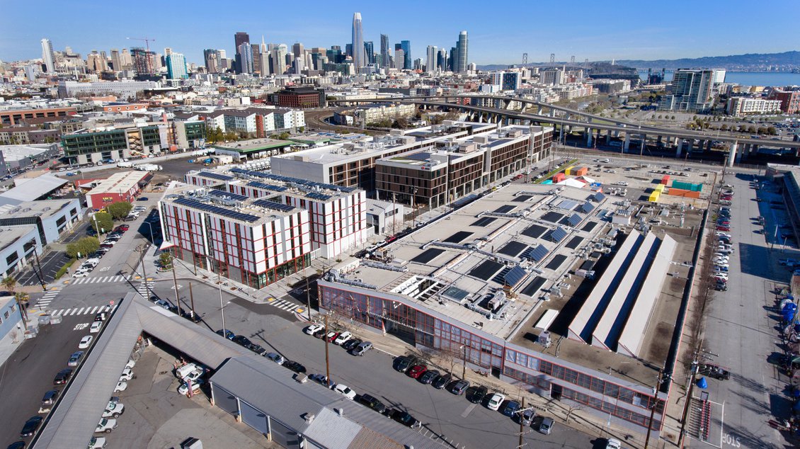 San Francisco Campus from above with view of San Francisco city skyline