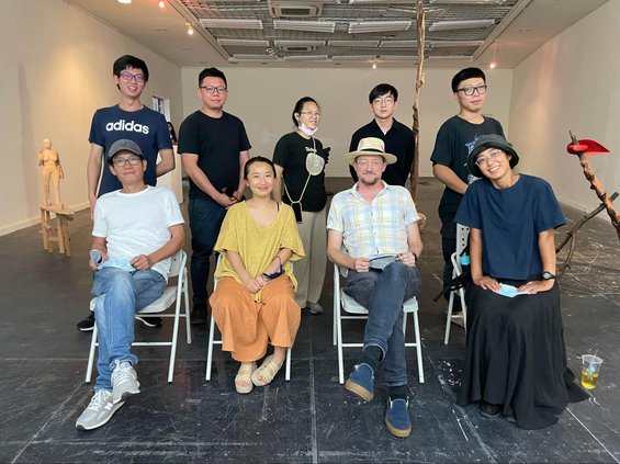 Critique Day At TUNNA: Front row from left to right Rhaic Talif, Judy Wu, Christopher Loomis, Maiko Sugano. Back Row: TUNNA Graduate students in Wood/Sculpture