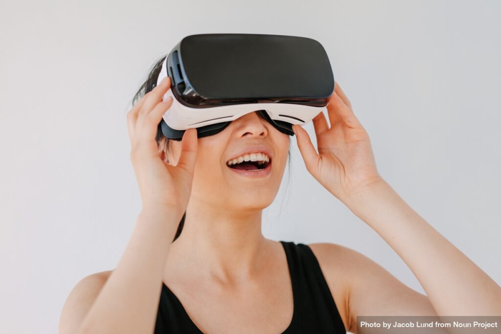 np_Close-up-of-happy-young-woman-using-the-VR-goggles-against-grey-background_0yqgL0_free-1024x683.jpeg